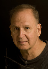 Image showing senior man retired head shot portrait in tee shirt