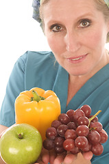 Image showing nurse or doctor medical female with healthy vegetables