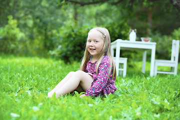 Image showing Smiling little girl outdoors.