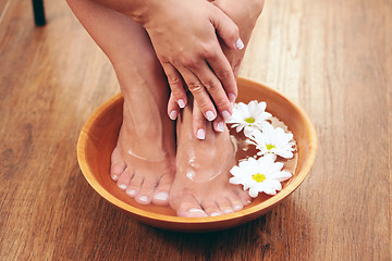 Image showing relaxing bath with flowers