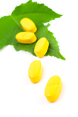 Image showing yellow vitamin pills