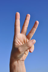 Image showing Woman hand-three fingers