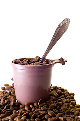 Image showing Cup with spoon and coffee beans