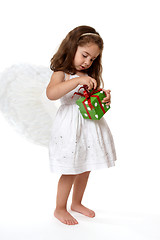 Image showing Angel  child with Christmas present