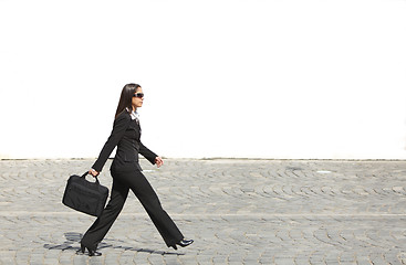 Image showing Businesswoman in a hurry