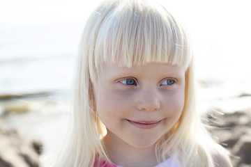 Image showing Smiling little girl outdoors.