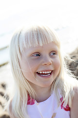 Image showing Happy little girl outdoors.