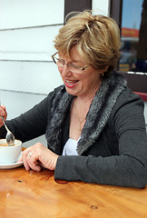 Image showing Woman at a cafe.