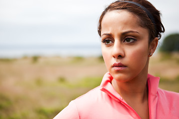 Image showing Sporty woman drinking water