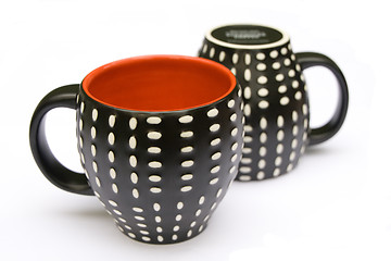 Image showing Two dotted coffee mugs