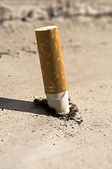 Image showing Put out cigarette