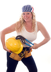 Image showing sexy contractor construction lady with tools