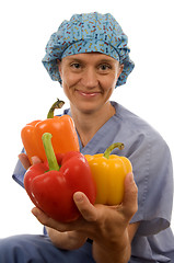 Image showing nurse or doctor medical female with healthy vegetables