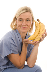 Image showing smiling happy nurse doctor with healthy fresh vegetables food