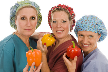 Image showing  nurses promoting healthy diet with fresh colorful bell peppers 