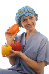 Image showing smiling happy nurse doctor with healthy fresh vegetables food