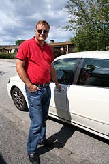 Image showing Swedish man and his car