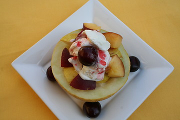 Image showing Galia melon with fruits inside