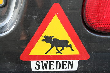 Image showing Traffic sign on car