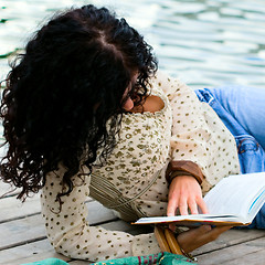 Image showing woman reading a book 