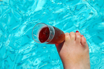 Image showing Foot with champagne glass