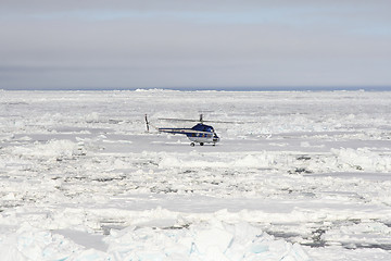 Image showing Helicopter flying