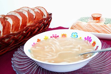 Image showing Chicken noodle soup with bread