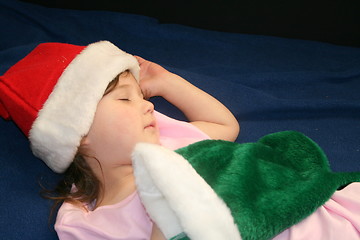 Image showing Pretty little girl in Santa hat