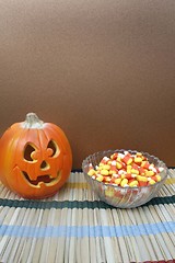 Image showing Jack-O-Lantern and bowl of candy