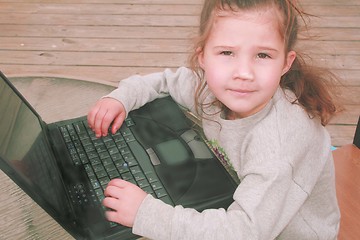 Image showing Young girl on laptop