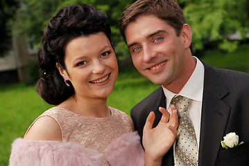 Image showing Close-up portrait of young smiling couple outdoors