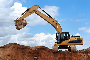 Image showing excavator with raised bucket