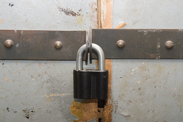 Image showing Padlock on a door