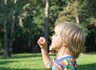 Image showing Boy with soap bubbles