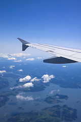 Image showing A view of clouds from an airplane window