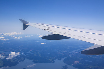 Image showing A view of clouds from an airplane window