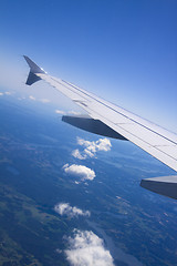 Image showing A view of clouds from an airplane window