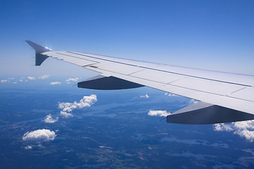 Image showing A view of clouds from an airplane window