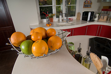 Image showing Fruits on red modern kitchen