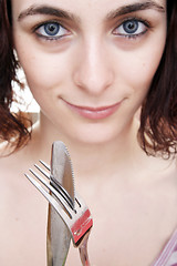 Image showing Woman waiting for dinner