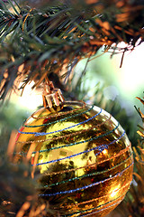 Image showing Christmas ornaments on tree.