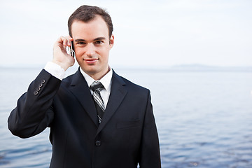 Image showing Caucasian businessman on the phone