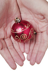 Image showing Hands and and Christmas Baubles
