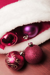Image showing Baubles and a Santa Hat