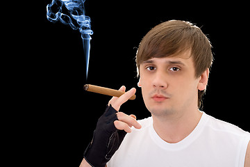 Image showing Portrait of the young man with a cigar