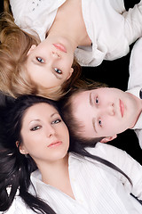 Image showing Portrait if the young man and two beautiful women