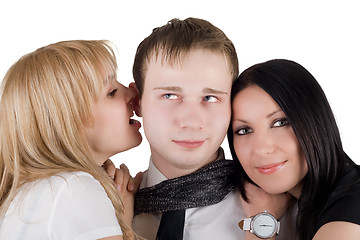 Image showing Portrait of the young man and two young women. Isolated