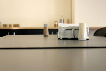 Image showing Napkin and Salt in a Cafeteria