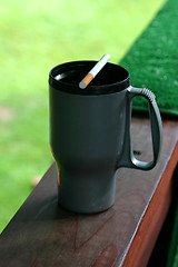 Image showing Coffee Mug and A Cigarette