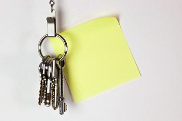 Image showing Bunch of keys with sticky note